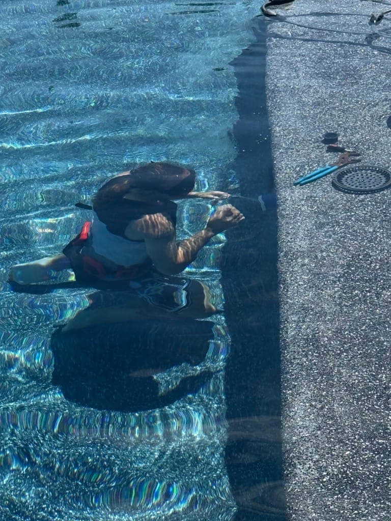 Underwater pool shell repair at the wall and return line