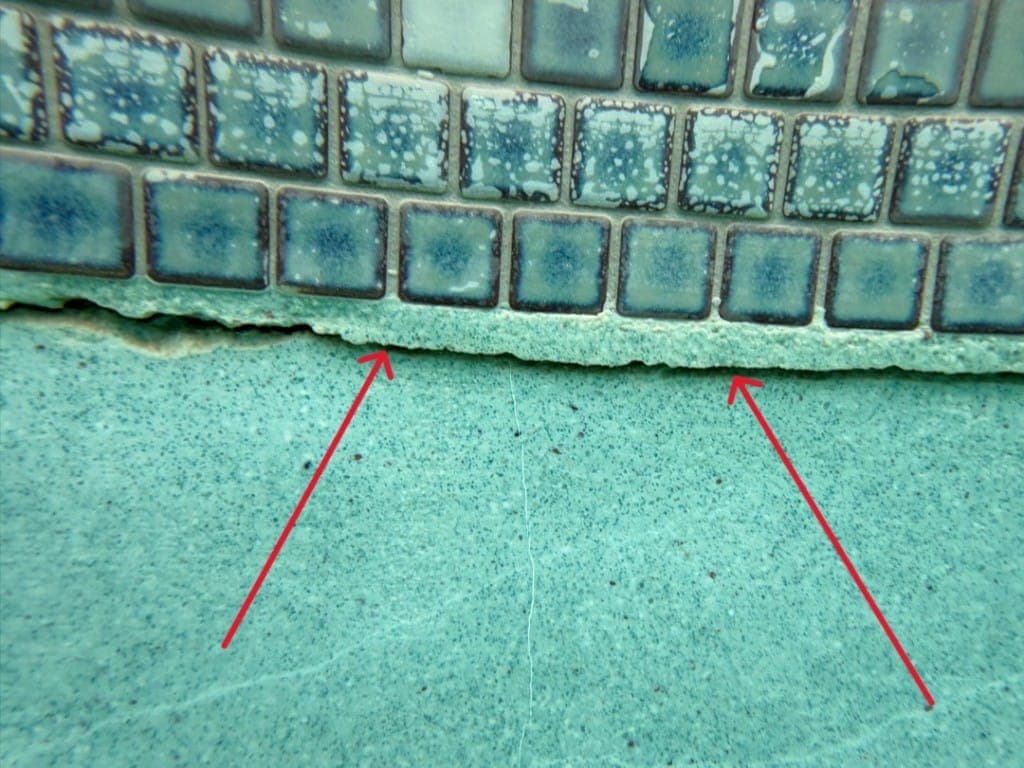 Separation between waterline tile and plaster identified as leak source — Dripping Springs