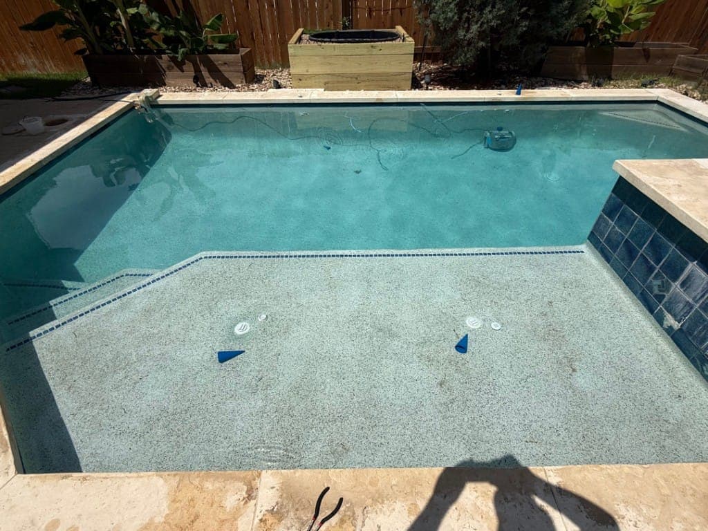 Leakalyzer water-loss testing equipment set up poolside — Leander