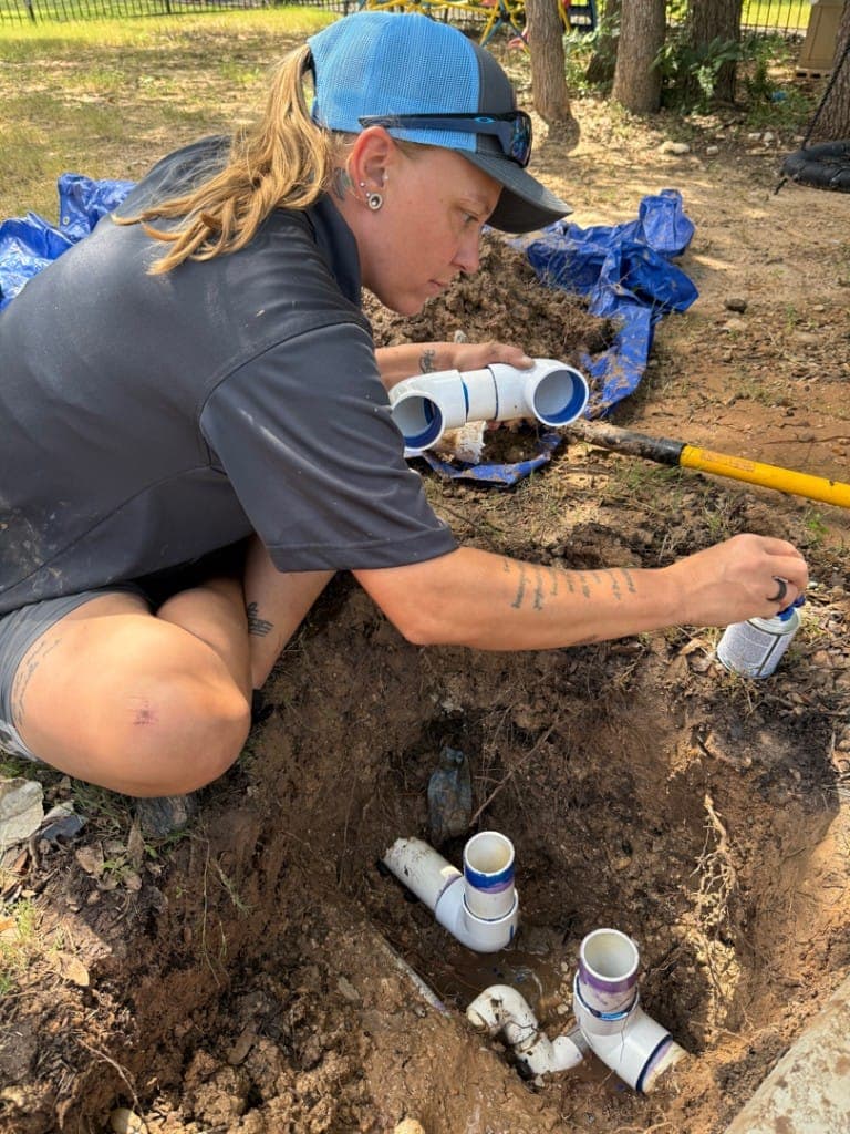 Diver performing underwater pool leak inspection in Central Texas