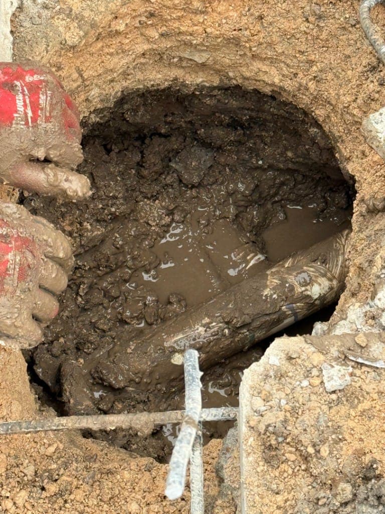 Diver performing underwater pool leak inspection in Central Texas